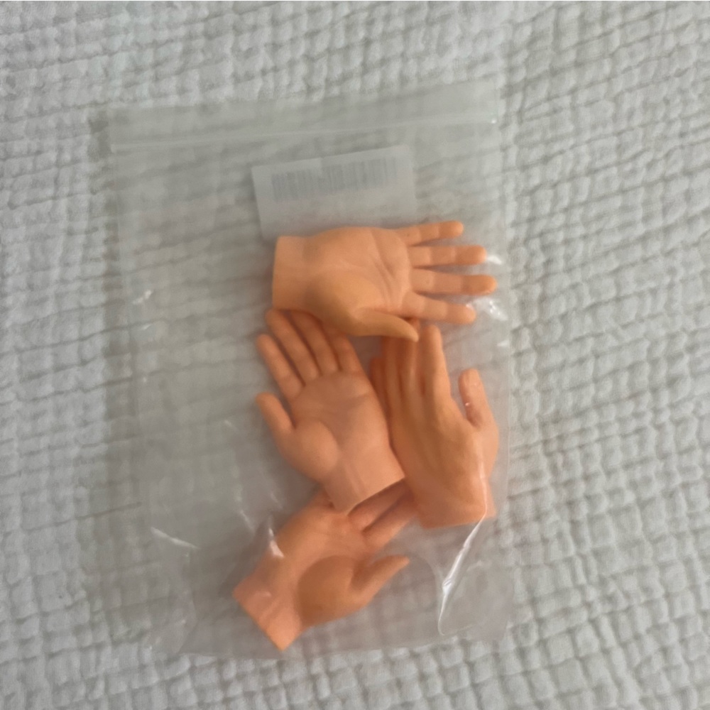 Two sets of tiny hands